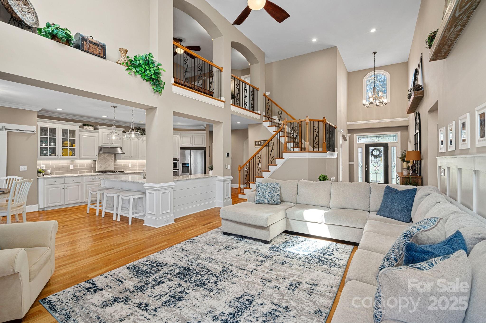 105 Elizabeth Brook Drive Davidson, NC 28036 - Photo 7 of 43 a living room with furniture and a rug