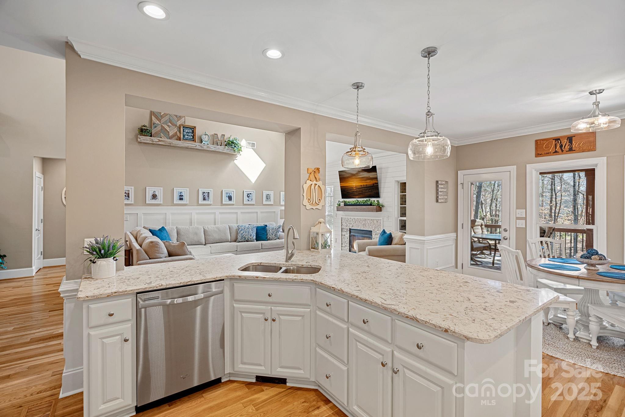 105 Elizabeth Brook Drive Davidson, NC 28036 - Photo 9 of 43 a kitchen with sink cabinets and window