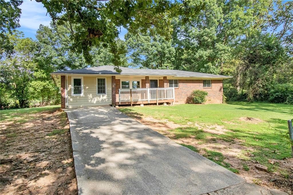 6498 Byrd Road Union City, GA 30291 - Photo 1 of 1 a view of a house with a yard