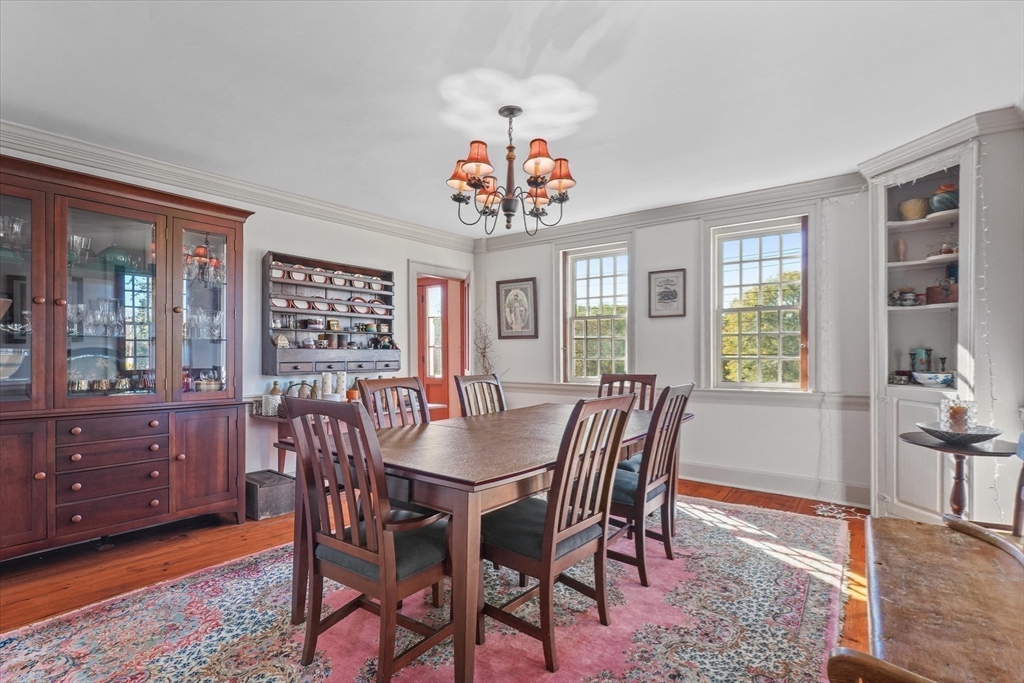 21 Sturbridge Road Brimfield, MA 01010 - Photo 13 of 41 a view of a dining room with furniture window and wooden floor
