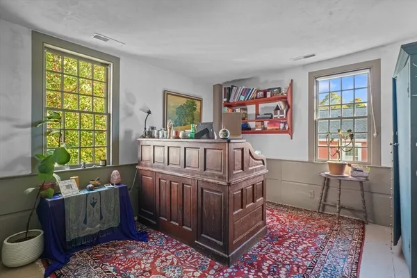a view of a livingroom with furniture and a couch