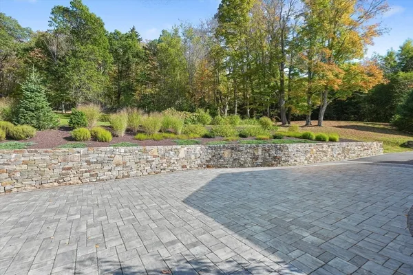 a blue sign that is on the side of a building