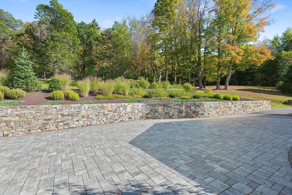 21 Sturbridge Road Brimfield, MA 01010 - Photo 27 of 41 a view of a yard with plants and a trees