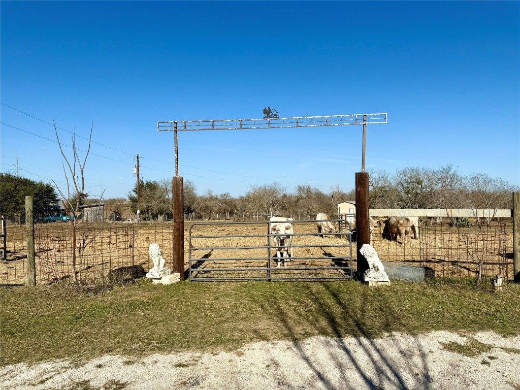 685 Fox Lane Lockhart, TX 78644 - Photo 3 of 39 View of yard with a gate and a view of rural / pastoral area