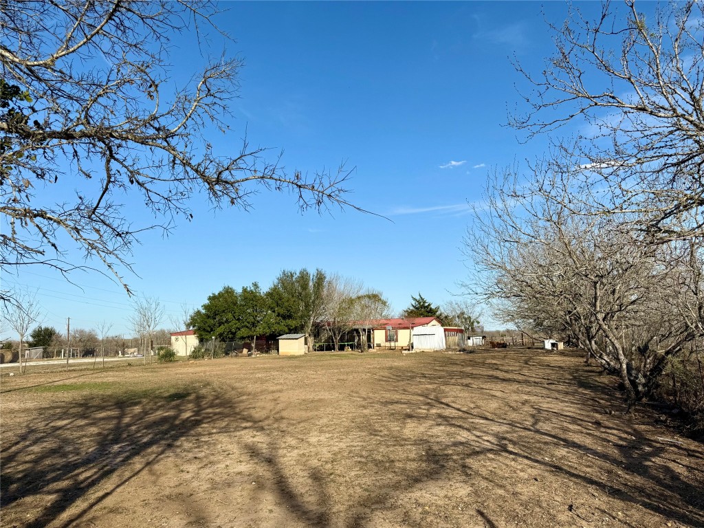 685 Fox Lane Lockhart, TX 78644 - Photo 6 of 39 View of yard featuring an outdoor structure