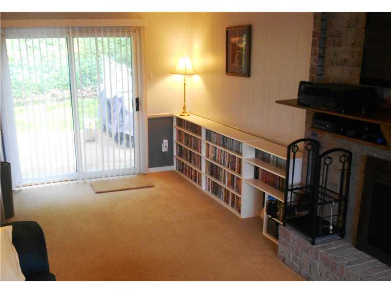 3885 Edge Road Brentwood, PA 15227 - Photo 11 of 24 Family Room. Custom built in shelves are perfect for storage or decorations. Slider leads to one of the two patios.