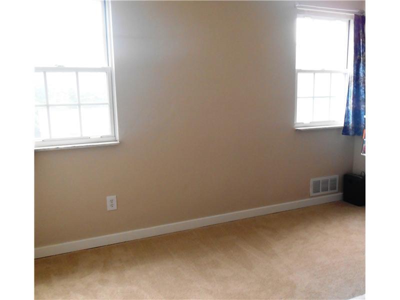 3885 Edge Road Brentwood, PA 15227 - Photo 20 of 24 Bedroom. Bright, natural light, neutral carpeting and paint.