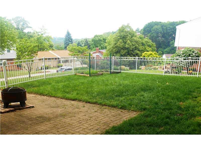 3885 Edge Road Brentwood, PA 15227 - Photo 23 of 24 Yard/Garden. Fenced side yard area with one of the paver patios. This patio leads out from the dining room.