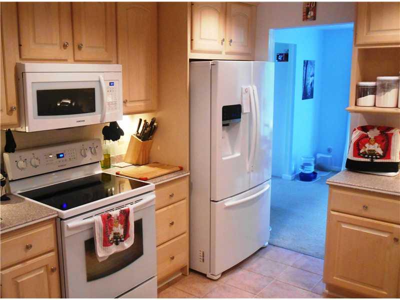 Kitchen. ALL NEW appliances!!  There is a gas line behind the stove for the buyer who prefers gas cooking!