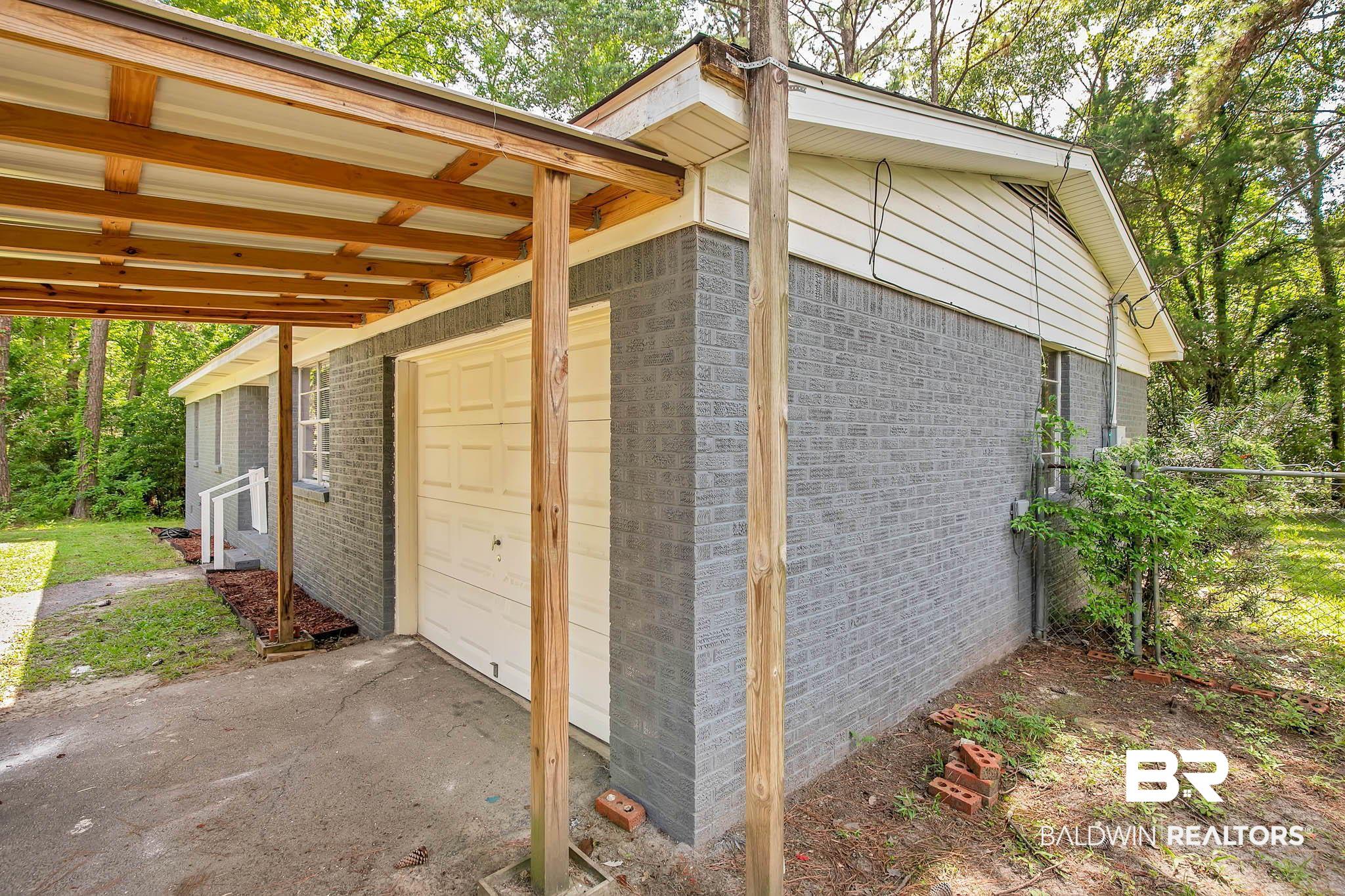 3304 Armond Drive Mobile, AL 36605 - Photo 43 of 62 View of outbuilding with asphalt driveway