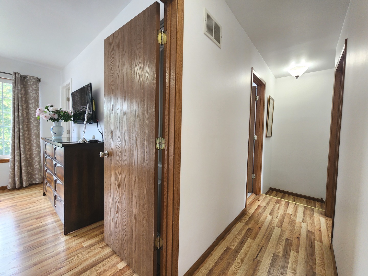 72 Wilton Lane Mundelein, IL 60060 - Photo 27 of 40 a view of hallway with wooden floor