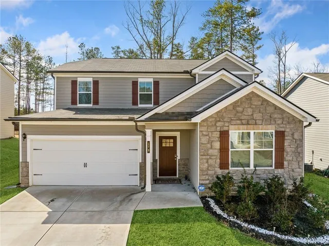 front view of house with a yard