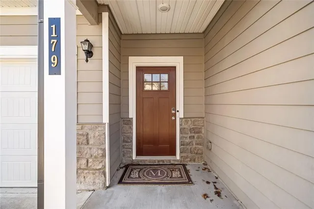 an aerial view of house with yard