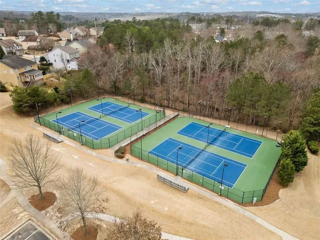 an aerial view of a house with a ocean view