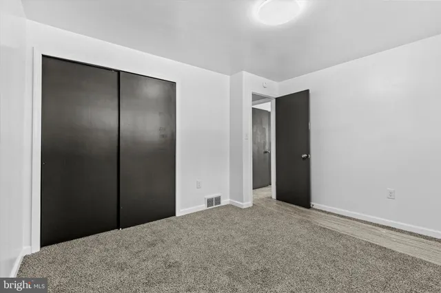 a view of hallway with closet