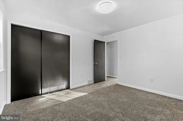 an empty room with closet