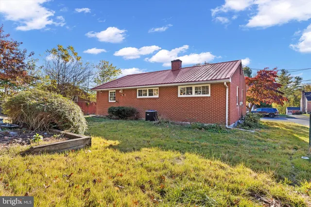 a view of a street with a houses