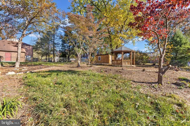 a view of a yard covered with snow