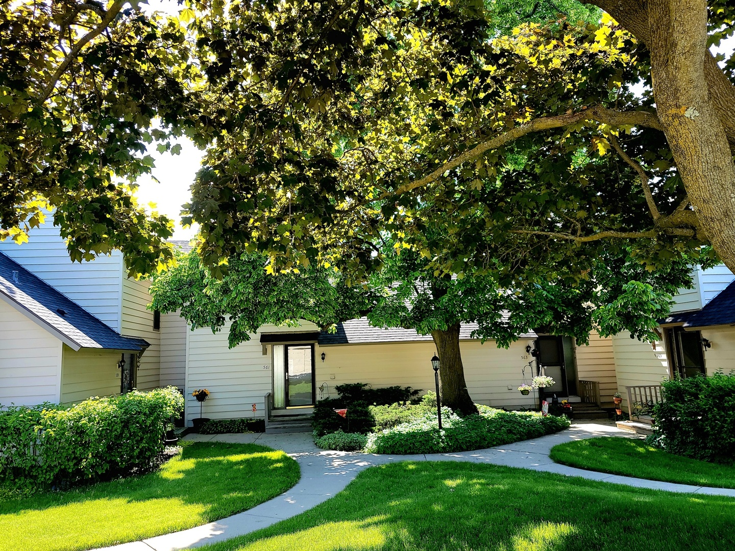 561 Dunham Road Gurnee, IL 60031 - Photo 2 of 30 a front view of a house with a yard and tree