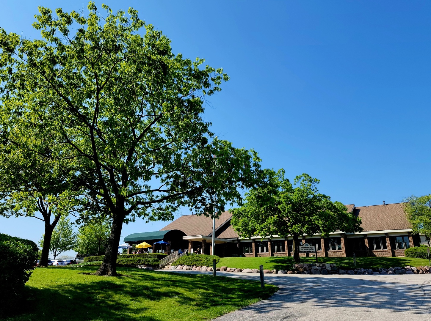 561 Dunham Road Gurnee, IL 60031 - Photo 30 of 30 a view of a big house with a big yard and large trees