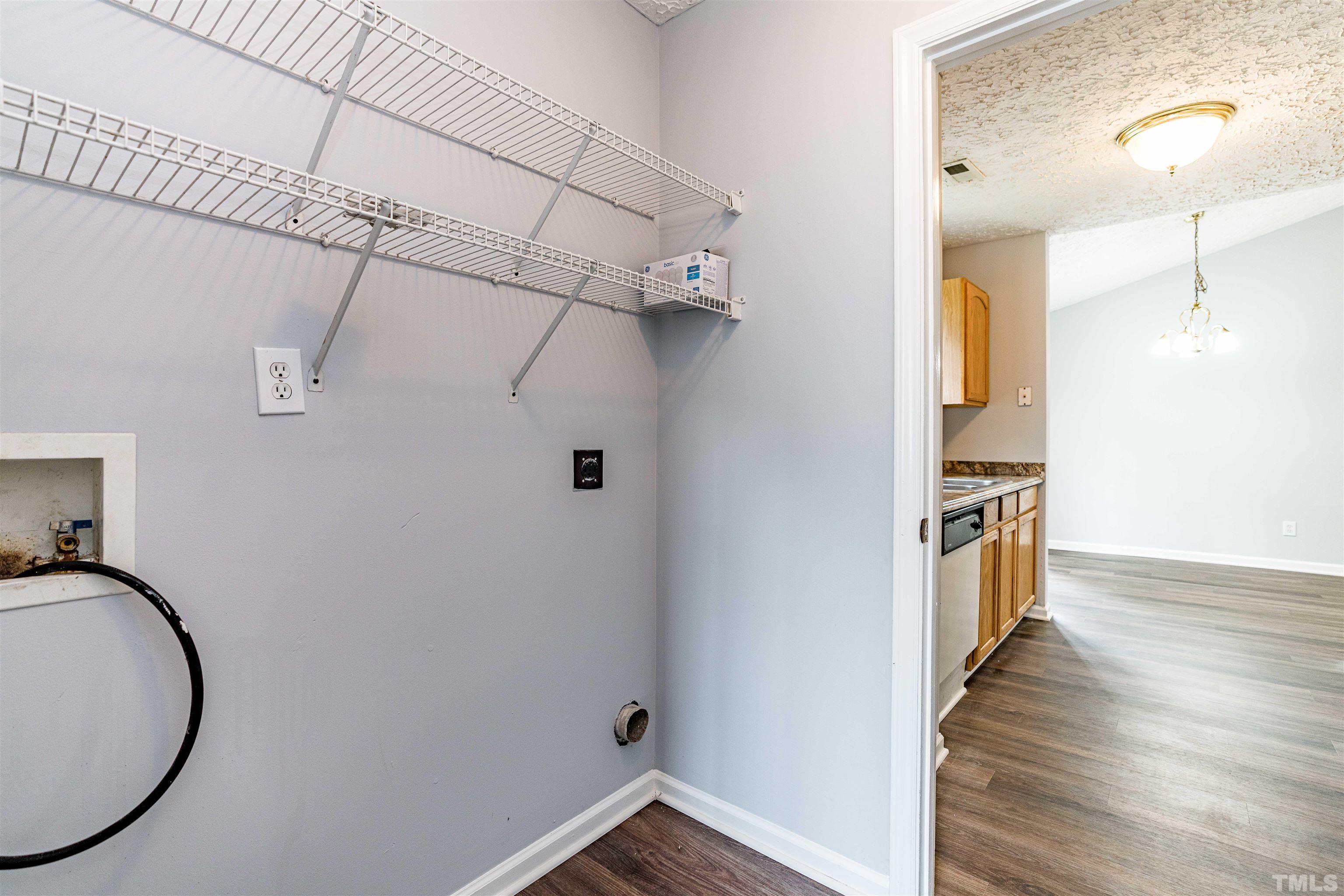 3208 Slippery Elm Drive Raleigh, NC 27610 - Photo 12 of 24 a view of a hallway with wooden floor