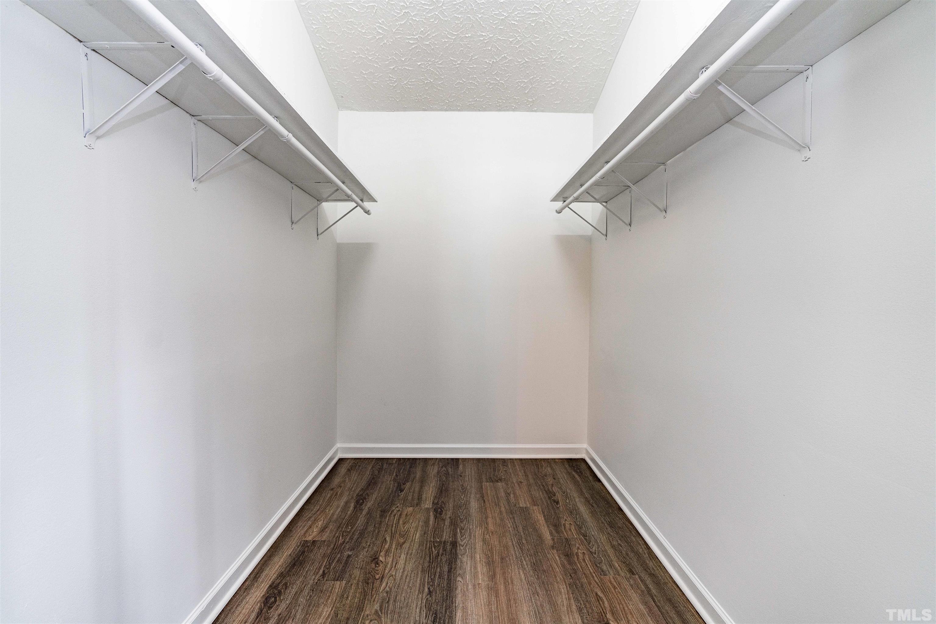 3208 Slippery Elm Drive Raleigh, NC 27610 - Photo 13 of 24 a view of a room with racks on the wall