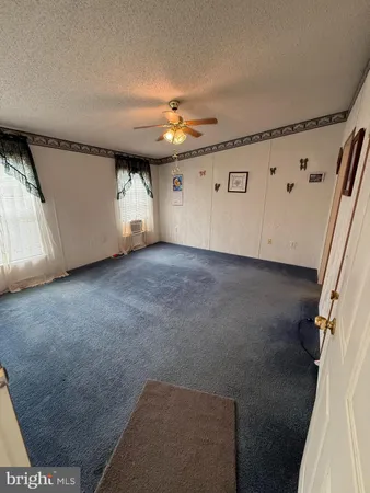 a view of a livingroom with a fireplace
