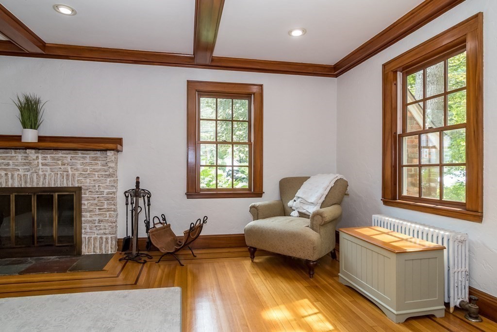 21 Cunningham Road Wellesley, MA 02481 - Photo 11 of 23 a living room with furniture and a fireplace