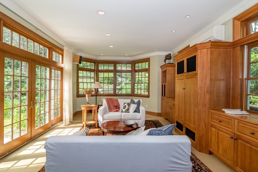 21 Cunningham Road Wellesley, MA 02481 - Photo 4 of 23 a bedroom with furniture and large windows