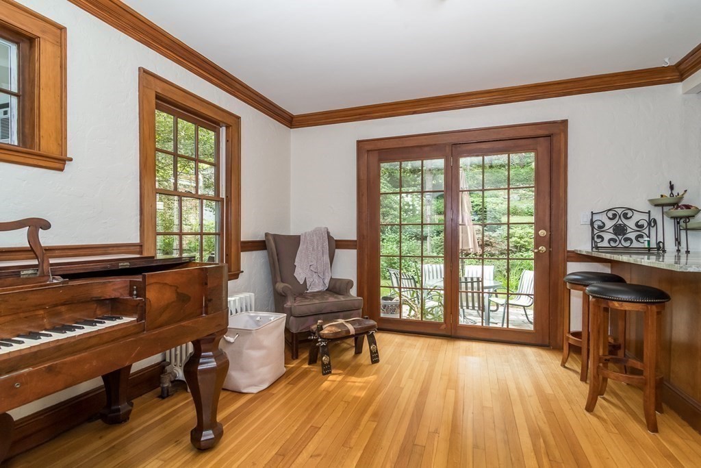21 Cunningham Road Wellesley, MA 02481 - Photo 8 of 23 a living room with furniture and a wooden floor