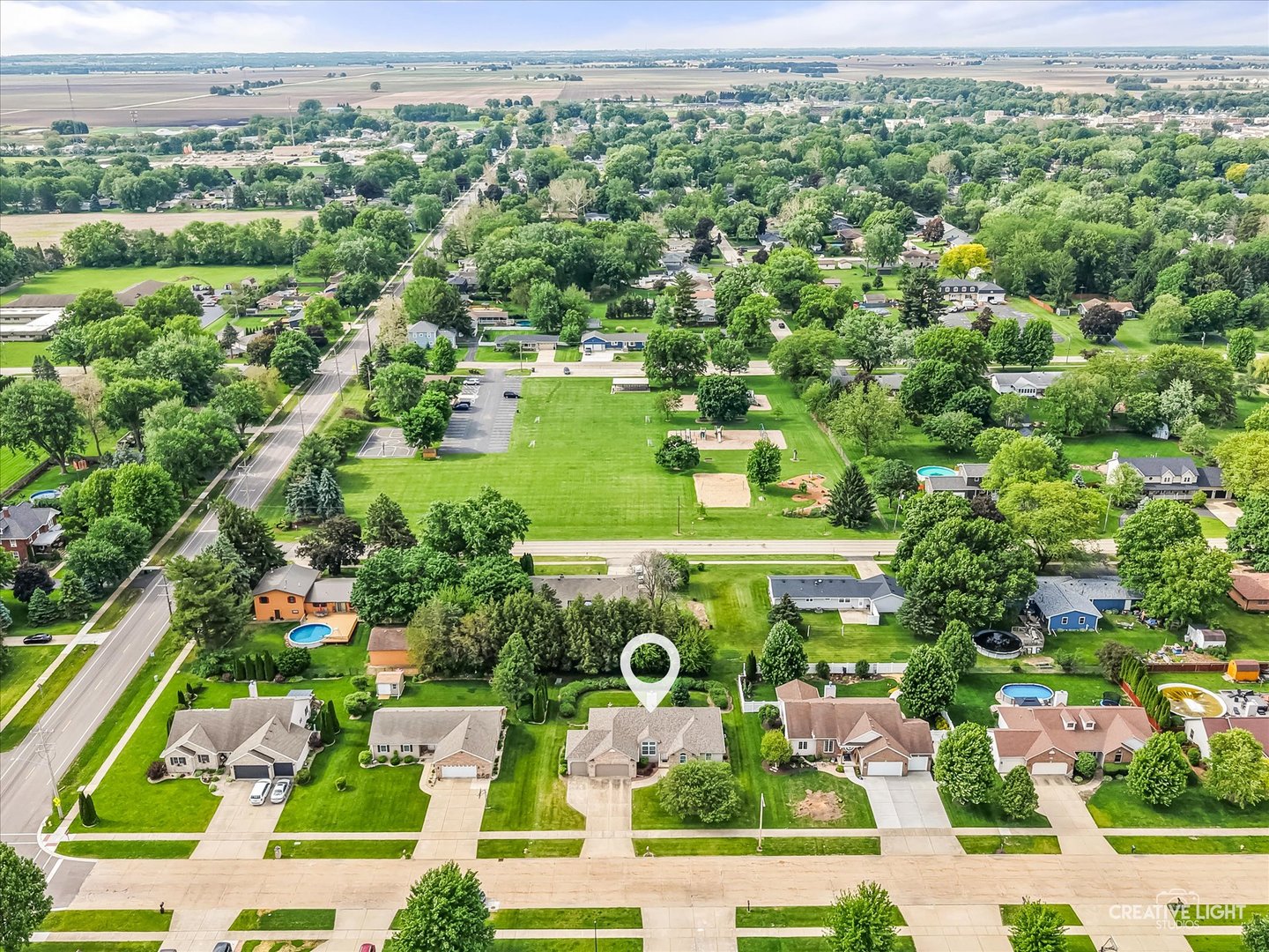 714 East Knights Road Sandwich, IL 60548 - Photo 30 of 33 an aerial view of residential houses with outdoor space and trees