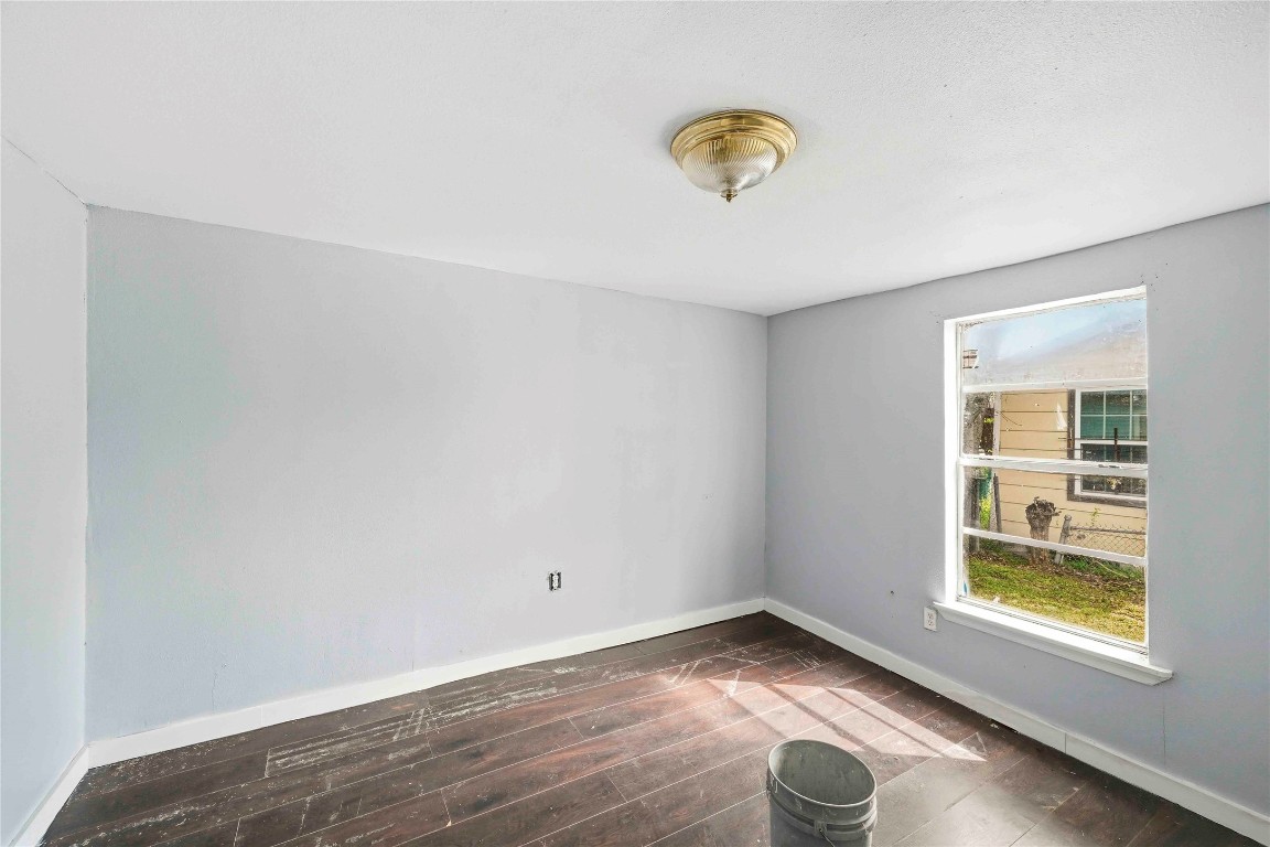 5513 Makeig Street Houston, TX 77026 - Photo 13 of 33 A bright and functional room with a window for natural light and a simple layout, offering a flexible space for a variety of uses.