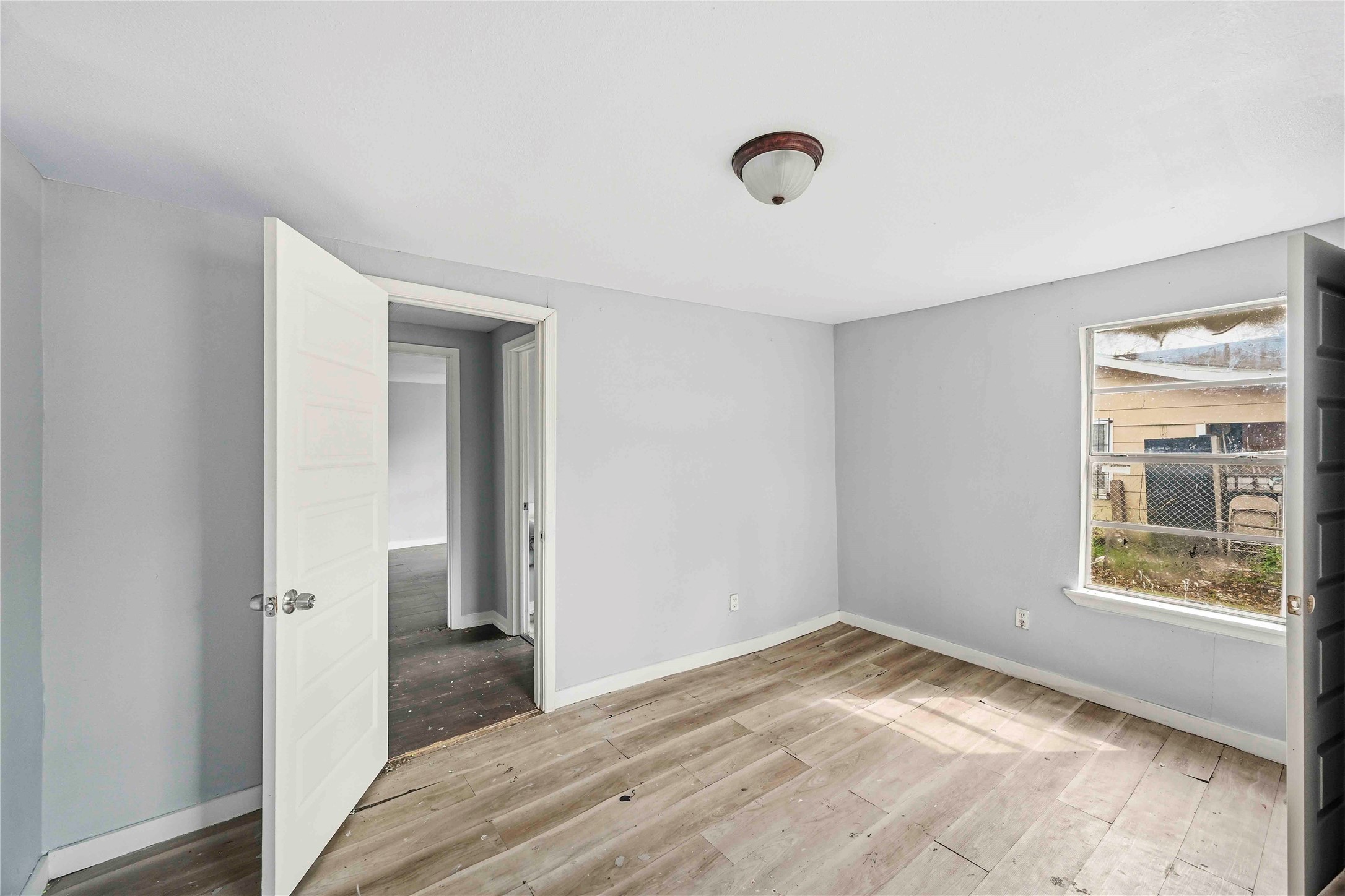 5513 Makeig Street Houston, TX 77026 - Photo 16 of 33 This room features natural light, a functional layout, and easy access to adjacent spaces, offering a flexible area ready for customization.