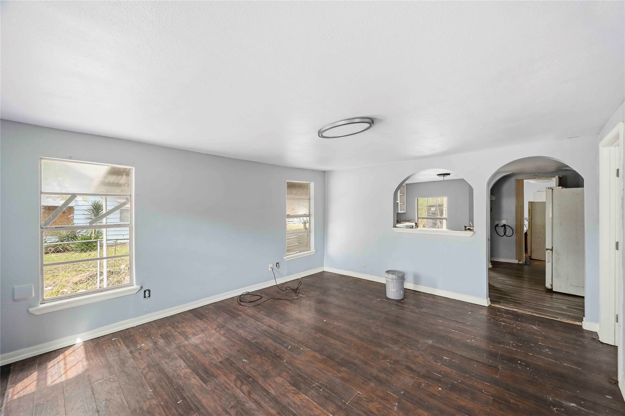 5513 Makeig Street Houston, TX 77026 - Photo 26 of 33 With natural light, a functional layout, and open access to the kitchen, this space offers a connected and versatile living area.