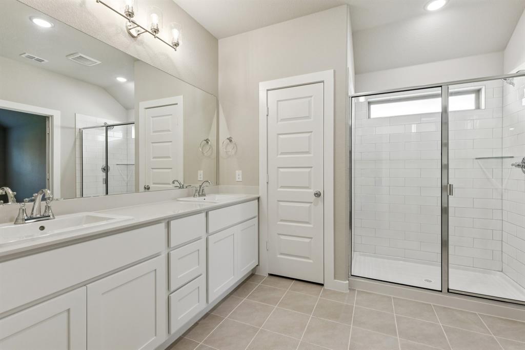 1404 Barbacoa Drive Haslet, TX 76052 - Photo 17 of 32 Primary Bathroom in the Emmy II home plan by Trophy Signature Homes - REPRESENTATIVE PHOTO