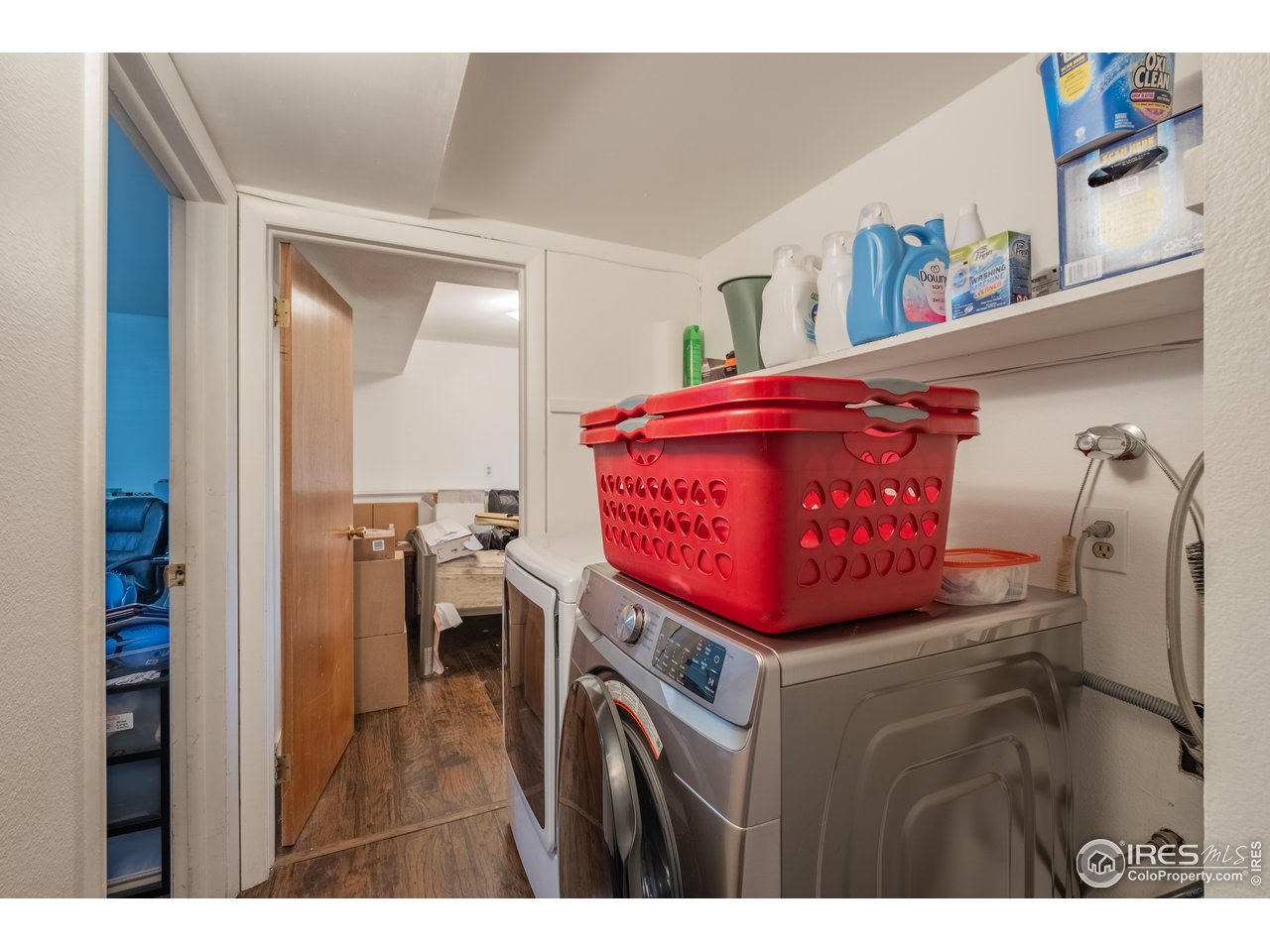 1602 29th Avenue Greeley, CO 80634 - Photo 14 of 18 a view of a kitchen with a refrigerator