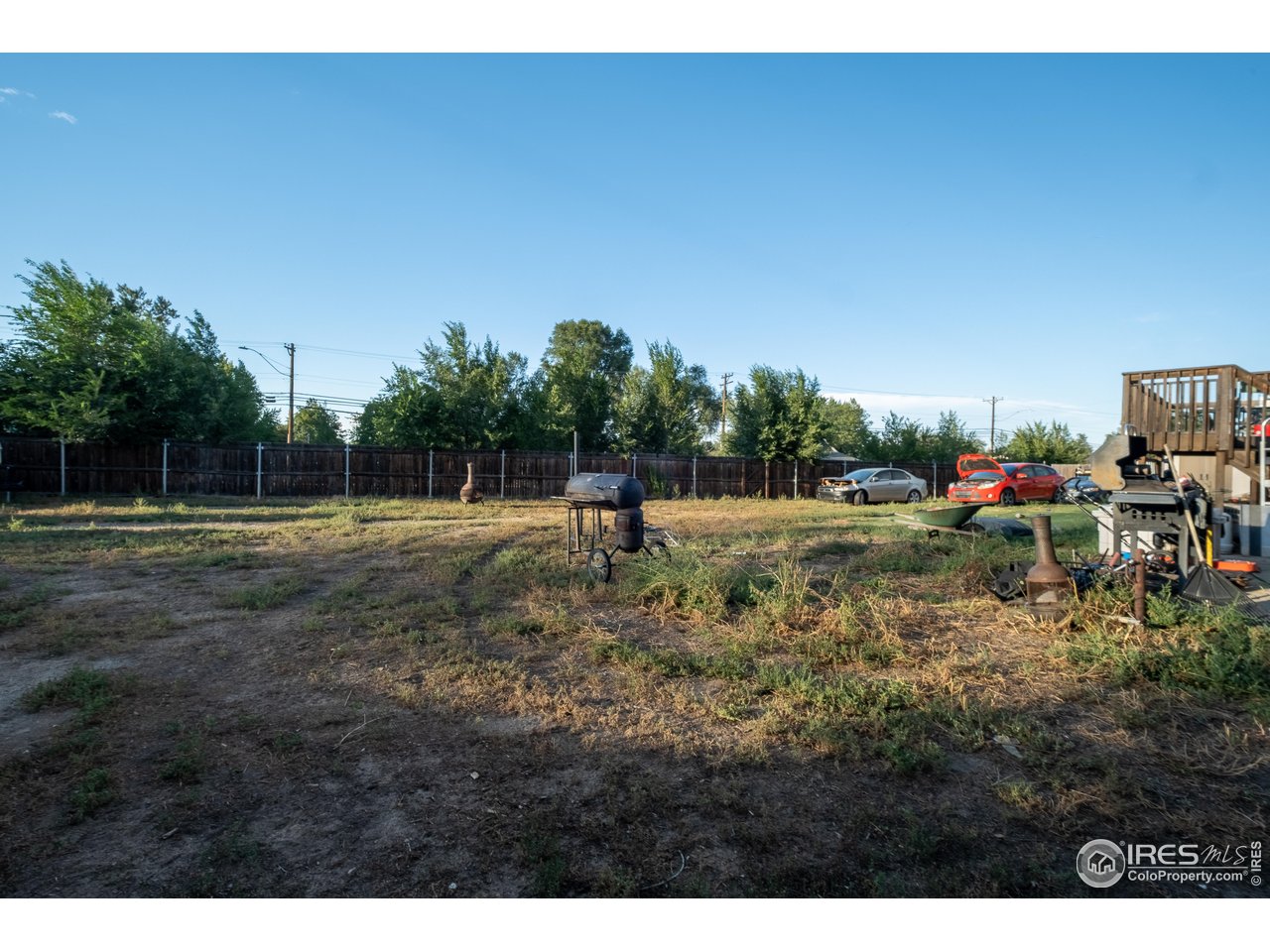 1602 29th Avenue Greeley, CO 80634 - Photo 17 of 18 a front view of a house with a yard