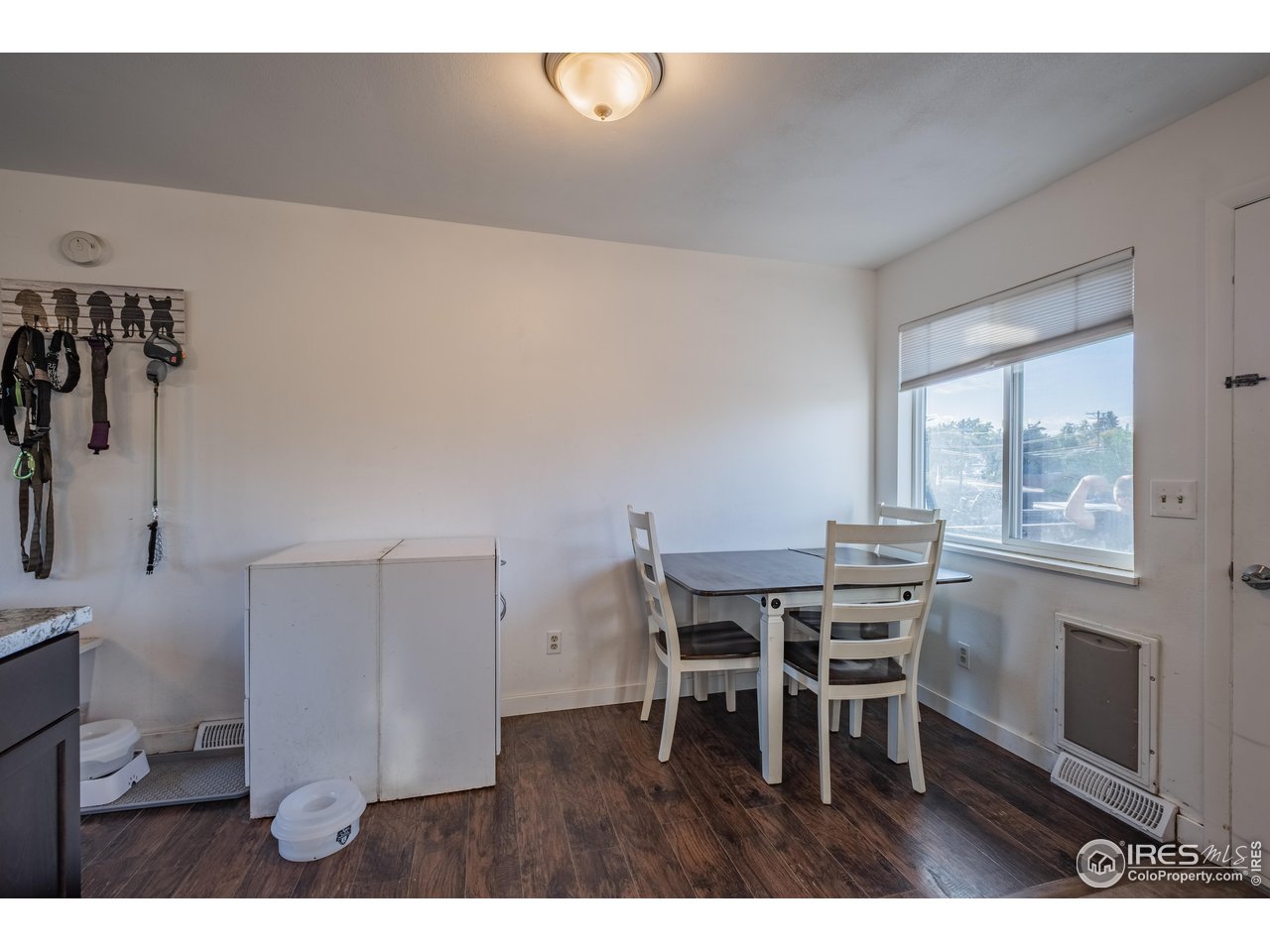 1602 29th Avenue Greeley, CO 80634 - Photo 3 of 18 a dining room with furniture and window