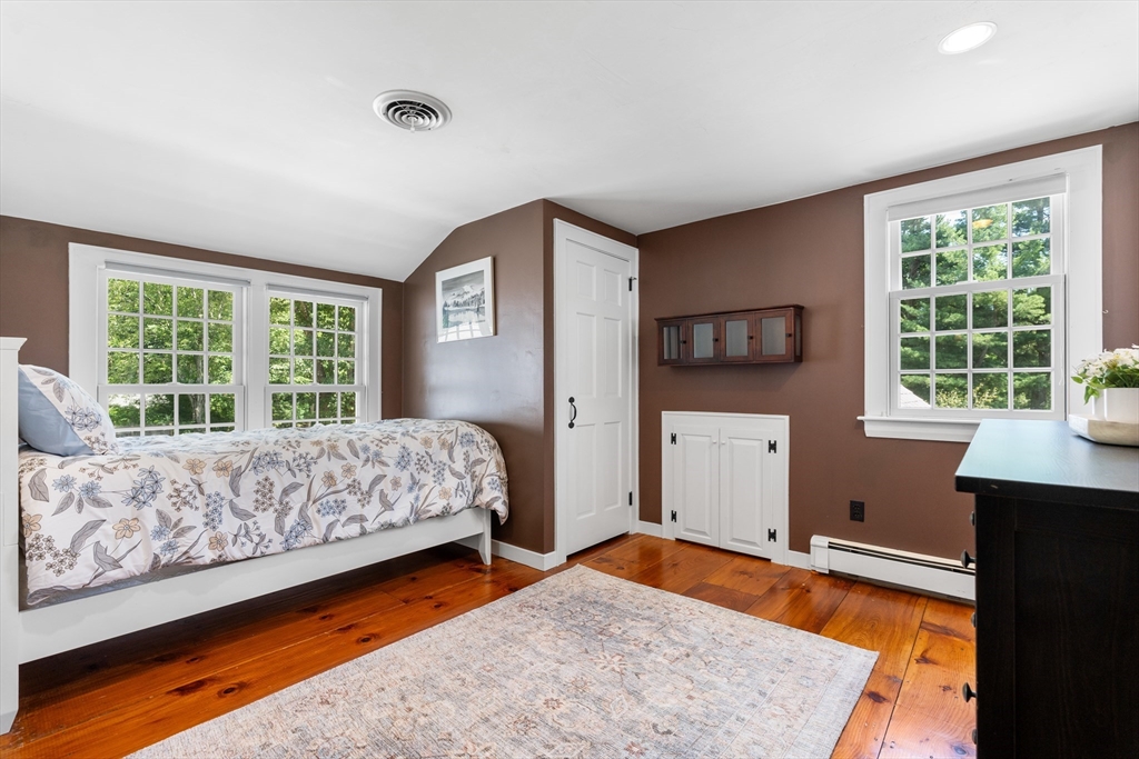 84 Hopestill Brown Road Sudbury, MA 01776 - Photo 27 of 42 a bedroom with a bed and a window