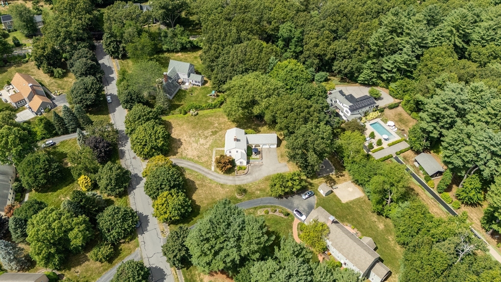 84 Hopestill Brown Road Sudbury, MA 01776 - Photo 37 of 42 an aerial view of residential house with outdoor space and trees all around