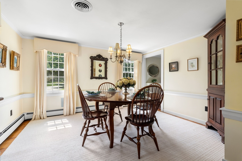 84 Hopestill Brown Road Sudbury, MA 01776 - Photo 7 of 42 a dining room with furniture a chandelier and wooden floor