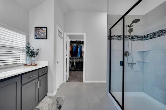 a view of a bathroom from a hallway