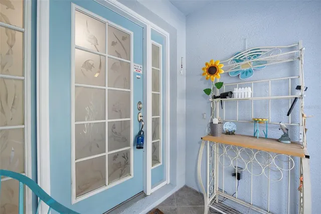 a living room with furniture and a gate