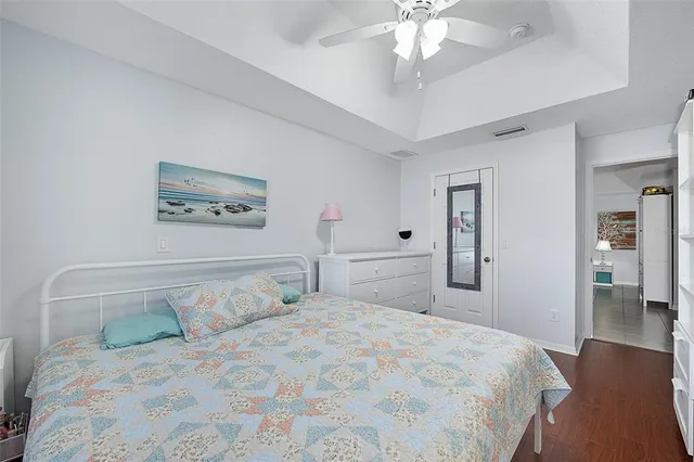 a bathroom with a double vanity sink mirror and toilet