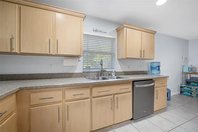a kitchen with a stove microwave and refrigerator