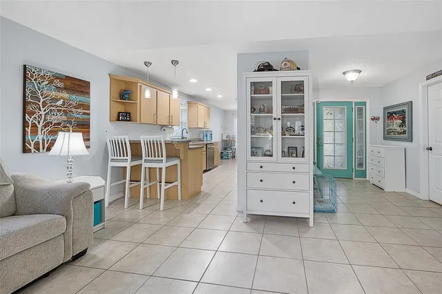 a view of a backyard with swimming pool