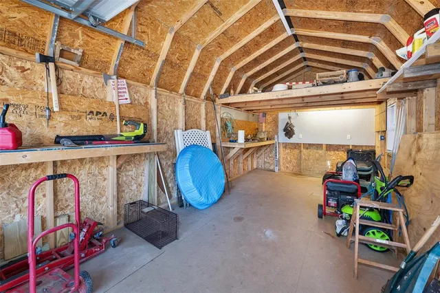 a view of a backyard with pathway