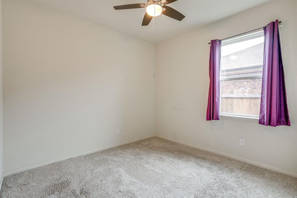 136 Kennedy Drive Venus, TX 76084 - Photo 16 of 27 an empty room with a window