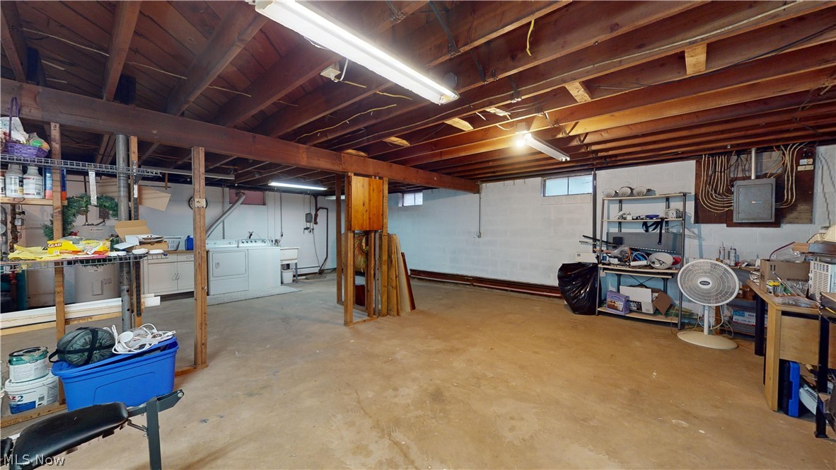 12326 Huntoon Road Painesville, OH 44077 - Photo 33 of 38 Basement with washer and dryer