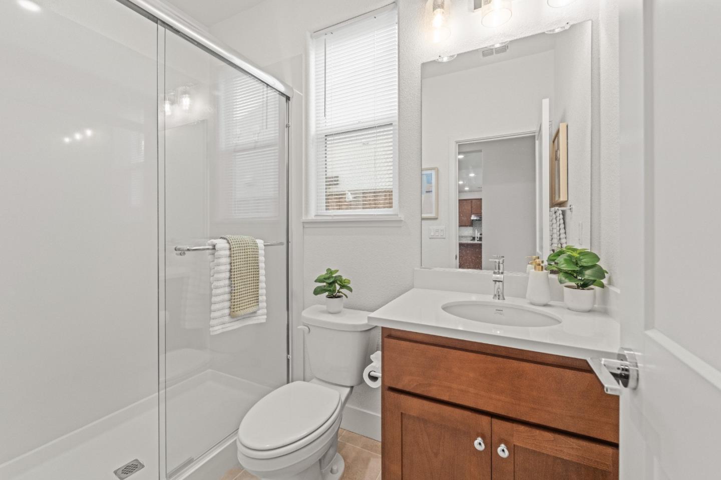 384 Ramos Ranch Road Oakley, CA 94561 - Photo 11 of 39 a bathroom with a sink toilet and shower